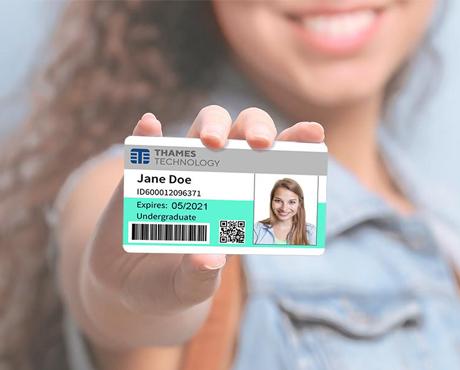 Woman holding ID card