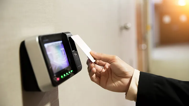 Business person using an access card