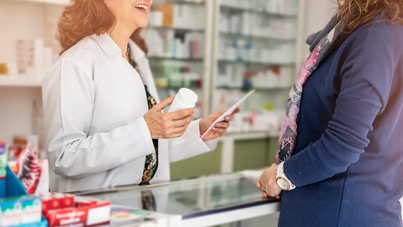 Female talking to pharmacist
