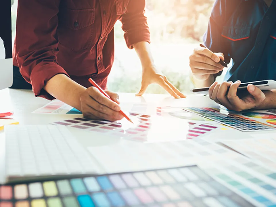 Graphic designers in discussion